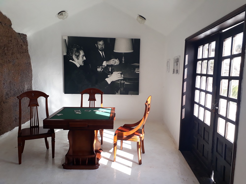 The bridge table at LagOmar and a photo of Omar Sharif playing cards.