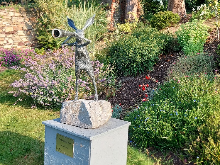 The curious hare, a garden sculpture