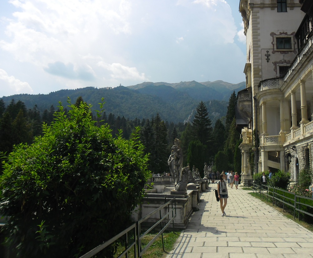 The terrace in front of Peles Castle with the mountains in the back