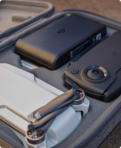 a rugged case with camera gear and lens for outdoor use