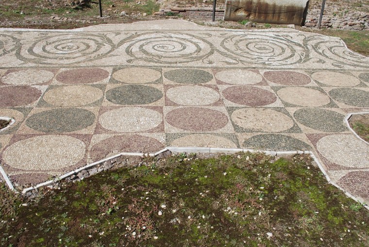 Natural stone floor mosaic in the baths complex.