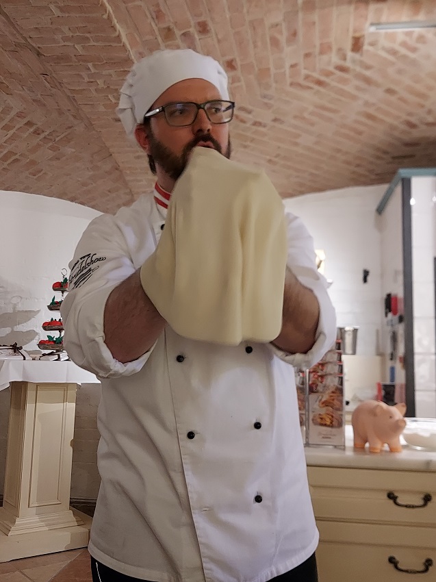 The confectioner is working on the strudel dough