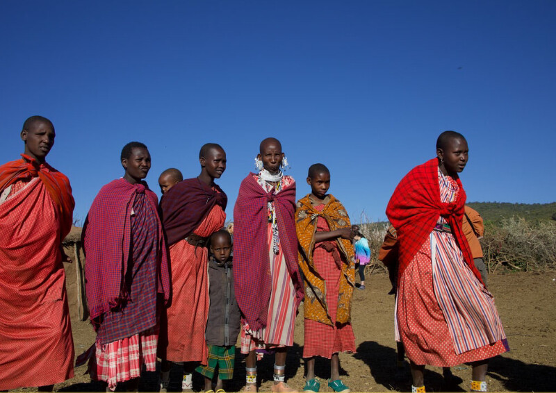 facts about the Maasai people: Maasai People in red shukas